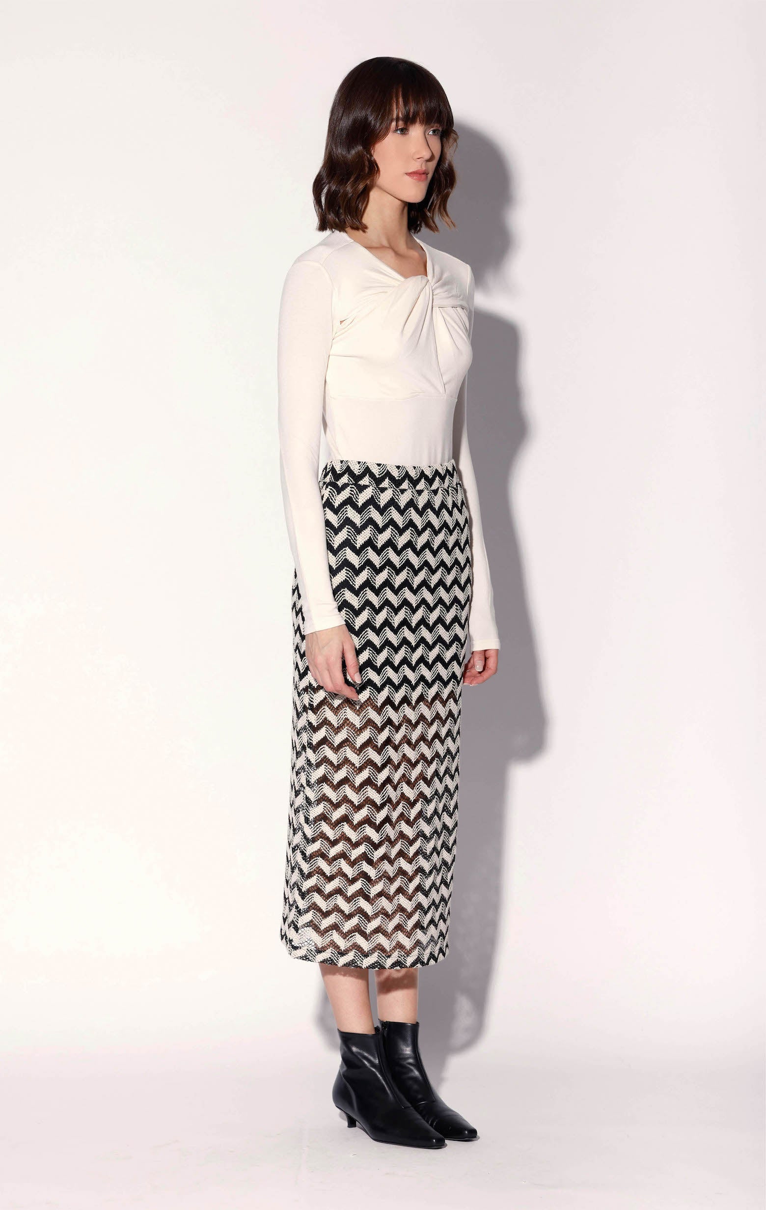 Corinne Top, Bone